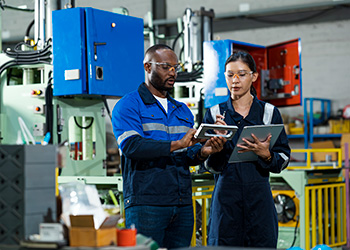 Two women working in manufacturing environment