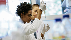 Two women in lab setting