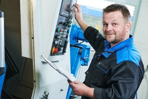 Employee working at panel