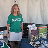 DVOP Sandra Gau conducting outreach at Irish Fest Hero Hut  Milwaukee WI