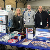 DVOP Sandra Gau, DVOP Michael Reynders, Careen Navigator William Newton. Milwaukee Veterans Standdown and Resource Fair Milwaukee, WI.